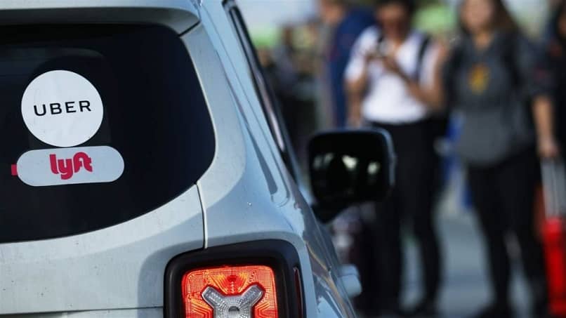 logotipos de etiqueta uber lyft ventana coche